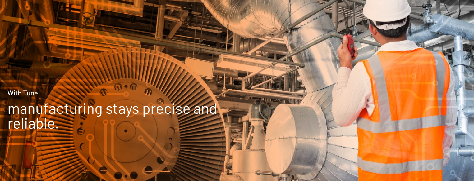 Engineer inspecting manufacturing equipment: with Tune, manufacturing stays precise and reliable